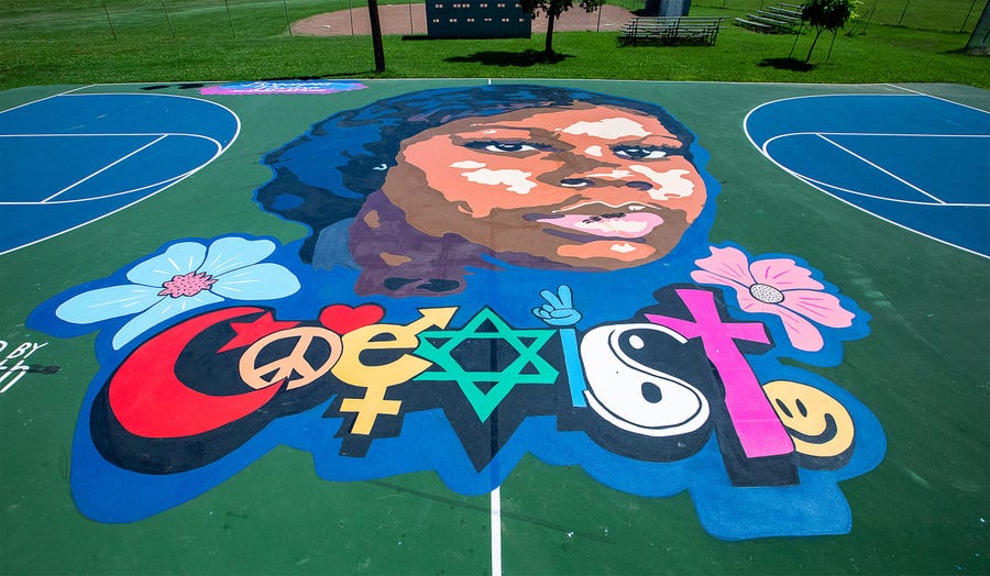 A mural of Breonna Taylor adorns the basketball court in Lannan Park in the Portland neighborhood on June 15, 2021, in Louisville, Kentucky.