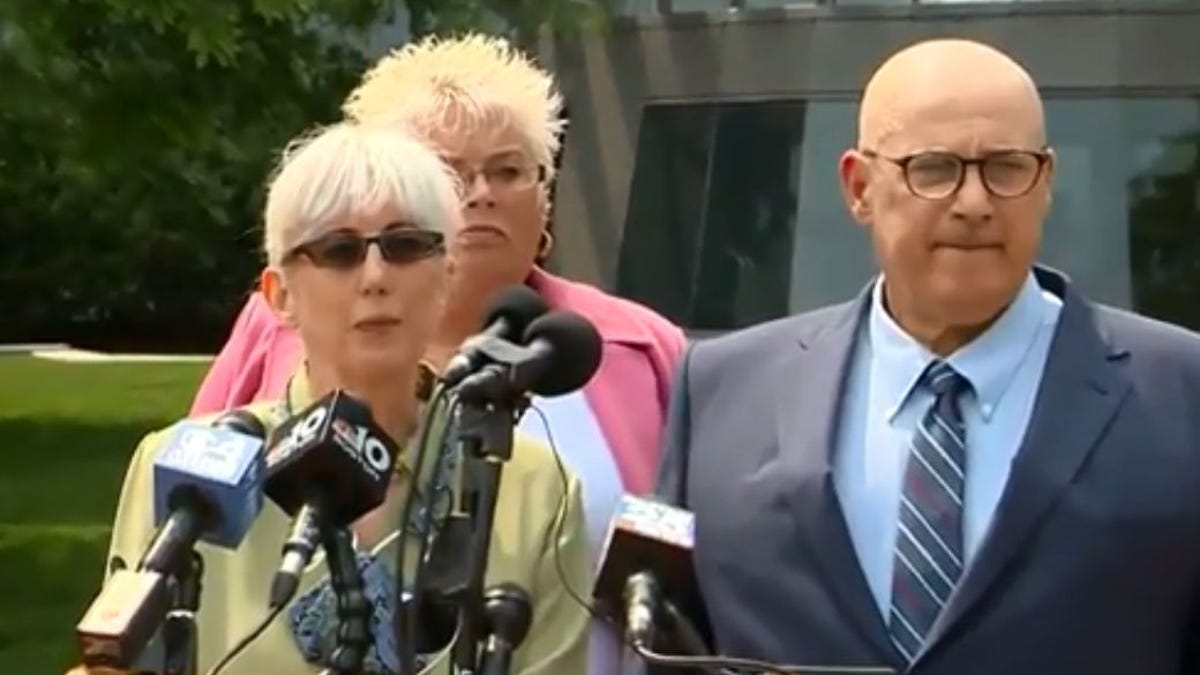 Ina and David Steiner, accompanied by their attorney Rosemary Scapicchio, background, accuse eBay of a terror campaign.