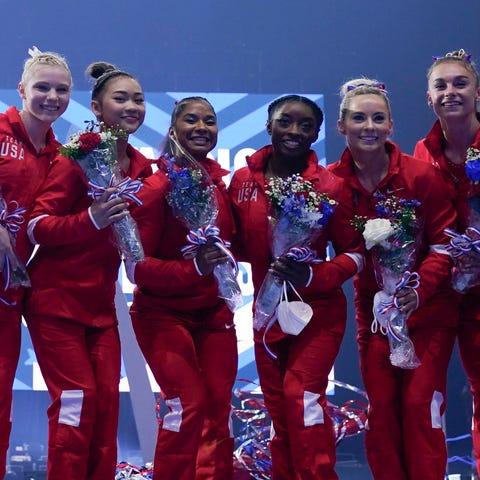 The women's Olympic team pose for a photo during t