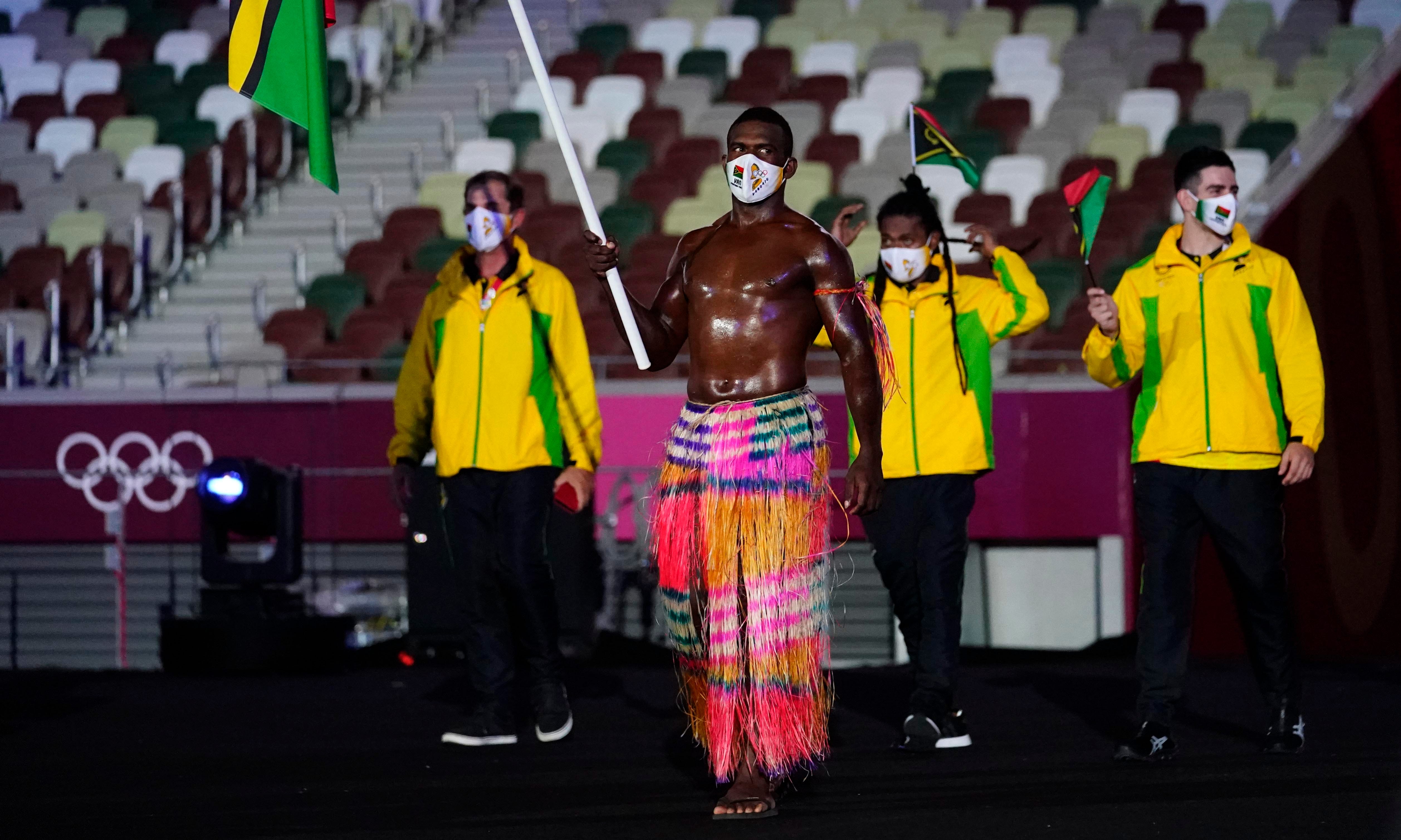 Tongan Pita Taufatofua Joined By Riilio Rii As Shirtless Flag Bearers