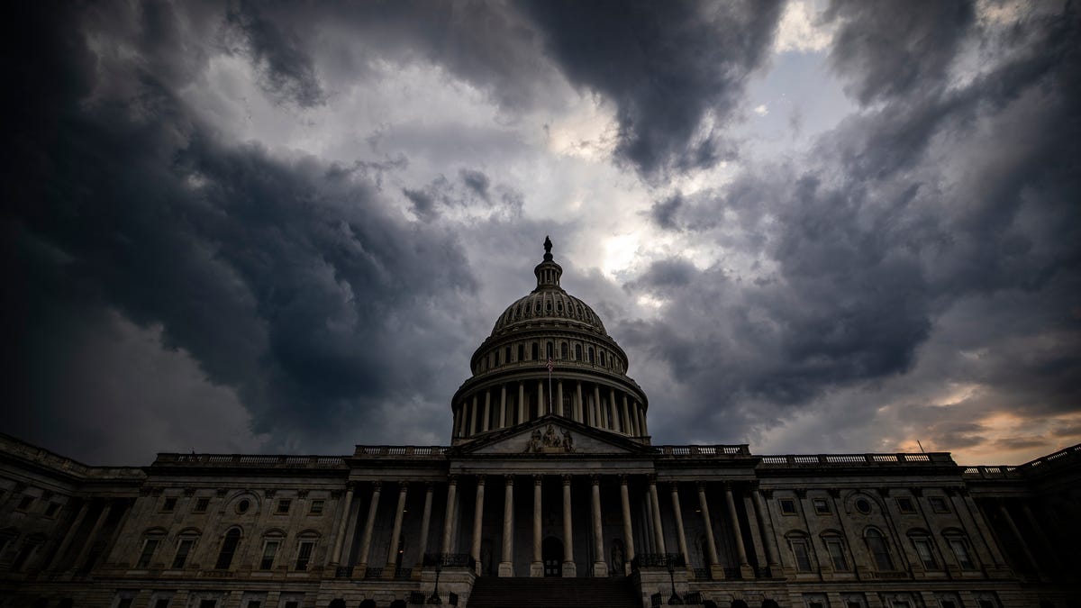 WASHINGTON, DC - JULY 26: Storm clouds hang above the U.S. Capitol Building after a heavy thunderstorm blew through the area on Capitol Hill on July 26, 2021 in Washington, DC. Negotiations over the Infrastructure Bill continue in Congress as the rush to get it passed before their August recess after the initial agreement fell apart. (Photo by Samuel Corum/Getty Images) ***BESTPIX*** ORG XMIT: 775686220 ORIG FILE ID: 1234220987