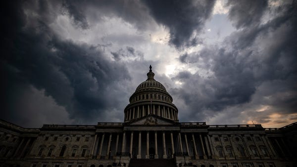 WASHINGTON, DC - JULY 26: Storm clouds hang above 