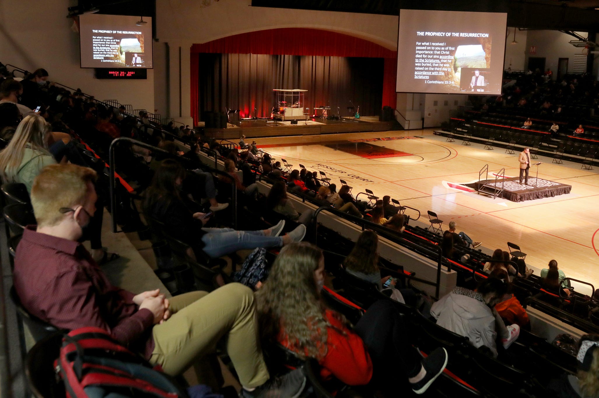 Students listen to Tiberius Rata preach on Tuesday, March 30, 2021.