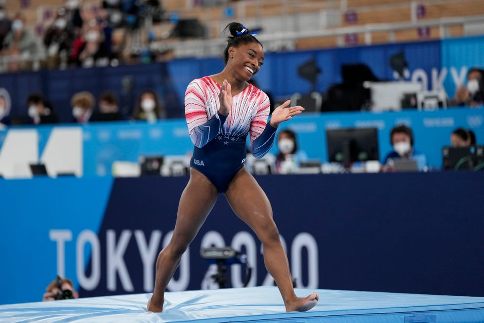 Simone Biles wins Olympic bronze in beam See photos from Tokyo Games