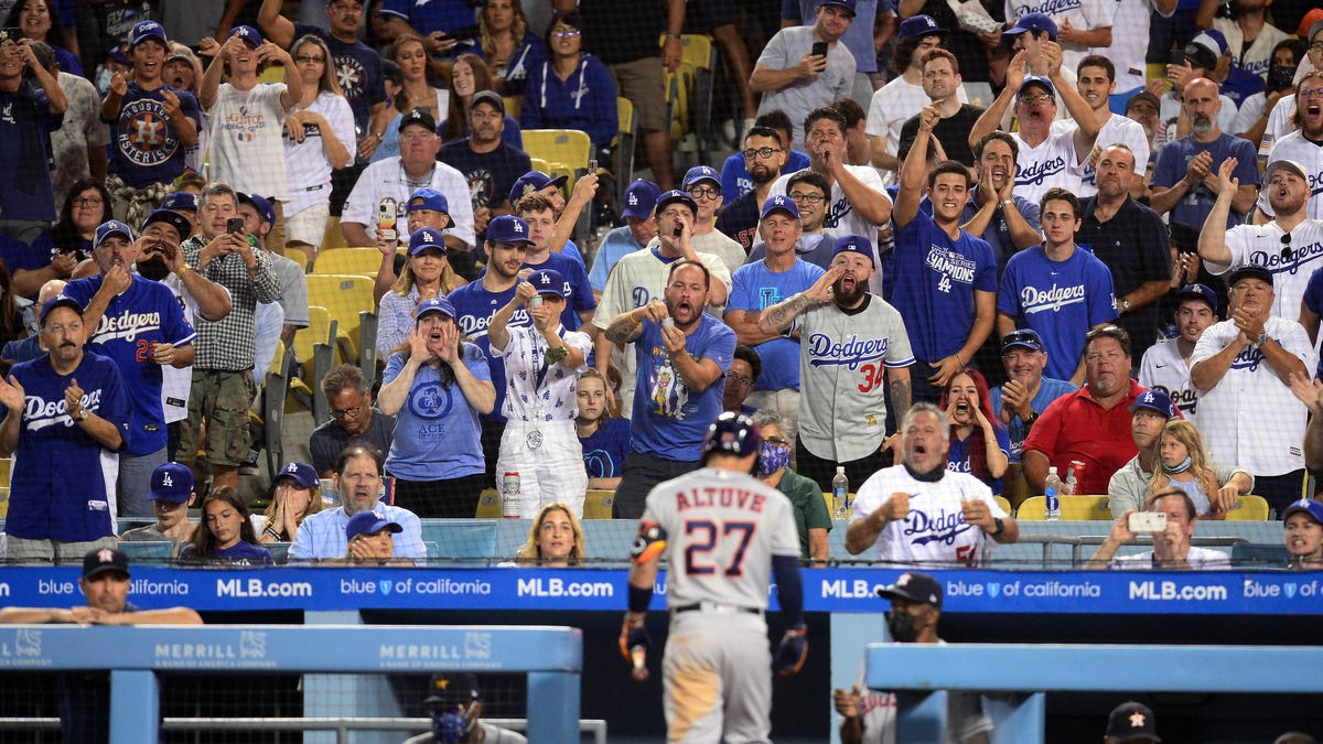 Aug. 3: Dodger Stadium spectators react after the Houston Astros' Jose Altuve strikes out during the fifth inning.