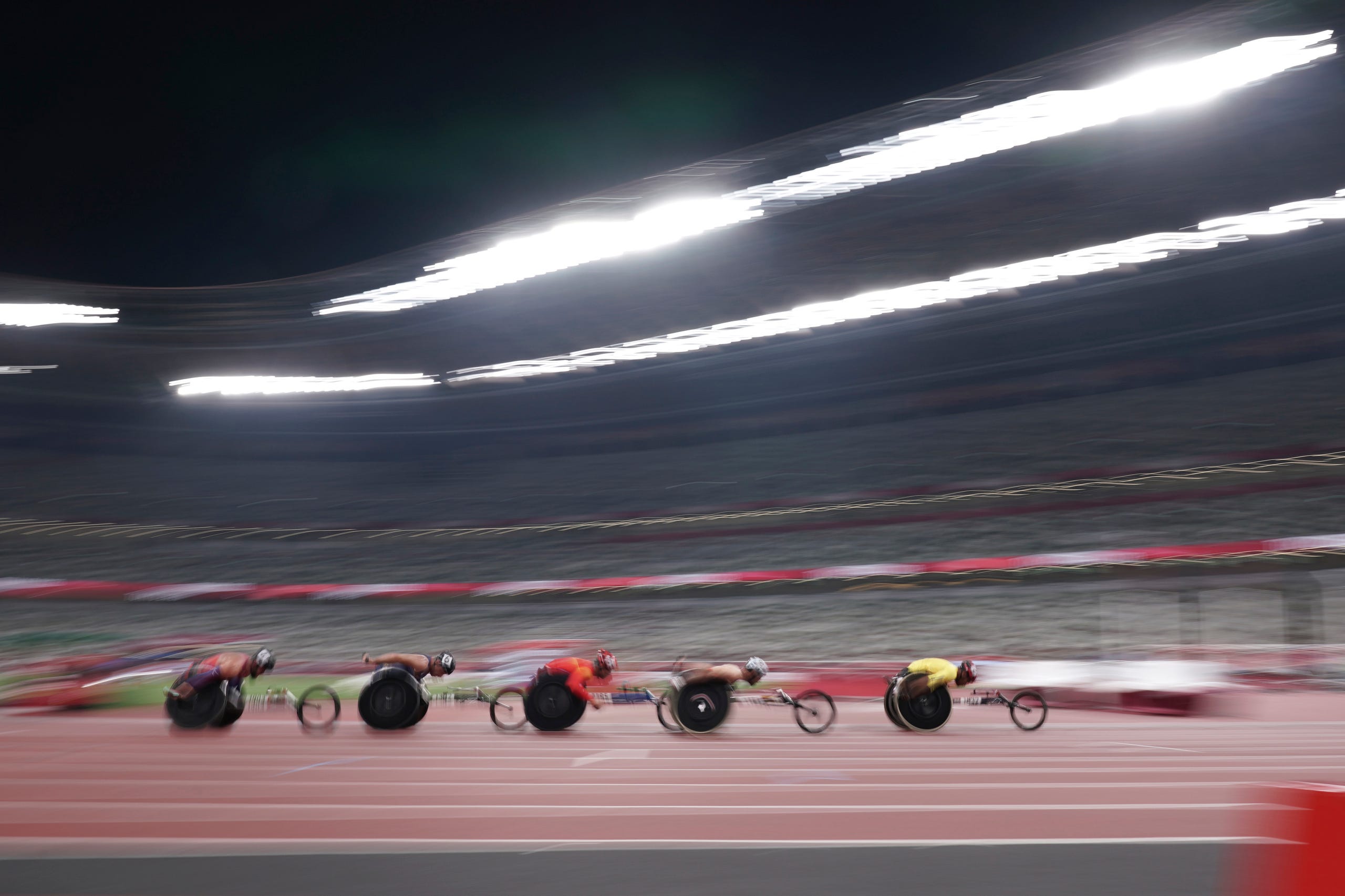 August 27, 2021: Athletes compete during men's T54 5000m heat at Tokyo 2020 Paralympic Games in Tokyo, Japan.