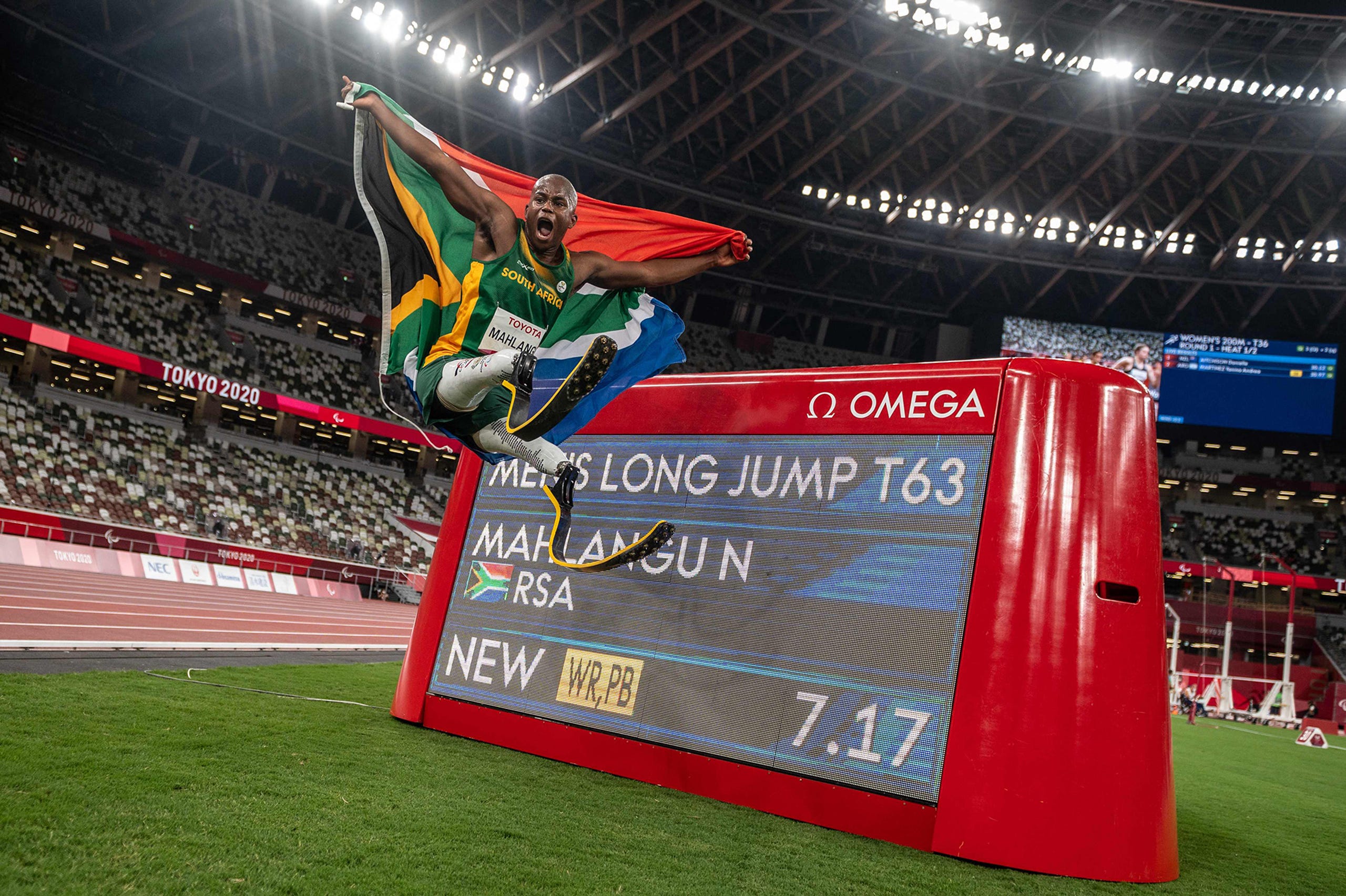 August 28, 2021: South Africa's Ntando Mahlangu celebrates after winning the men's long jump - T63 final of the Tokyo 2020 Paralympic Games at the Olympic Stadium in Tokyo.