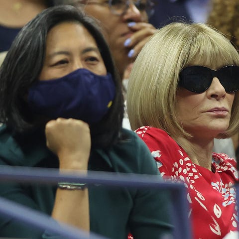 Kim Ng (left) sits next to Anna Wintour during the