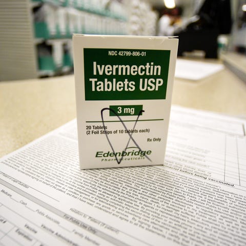 A box of ivermectin is shown in a pharmacy as phar