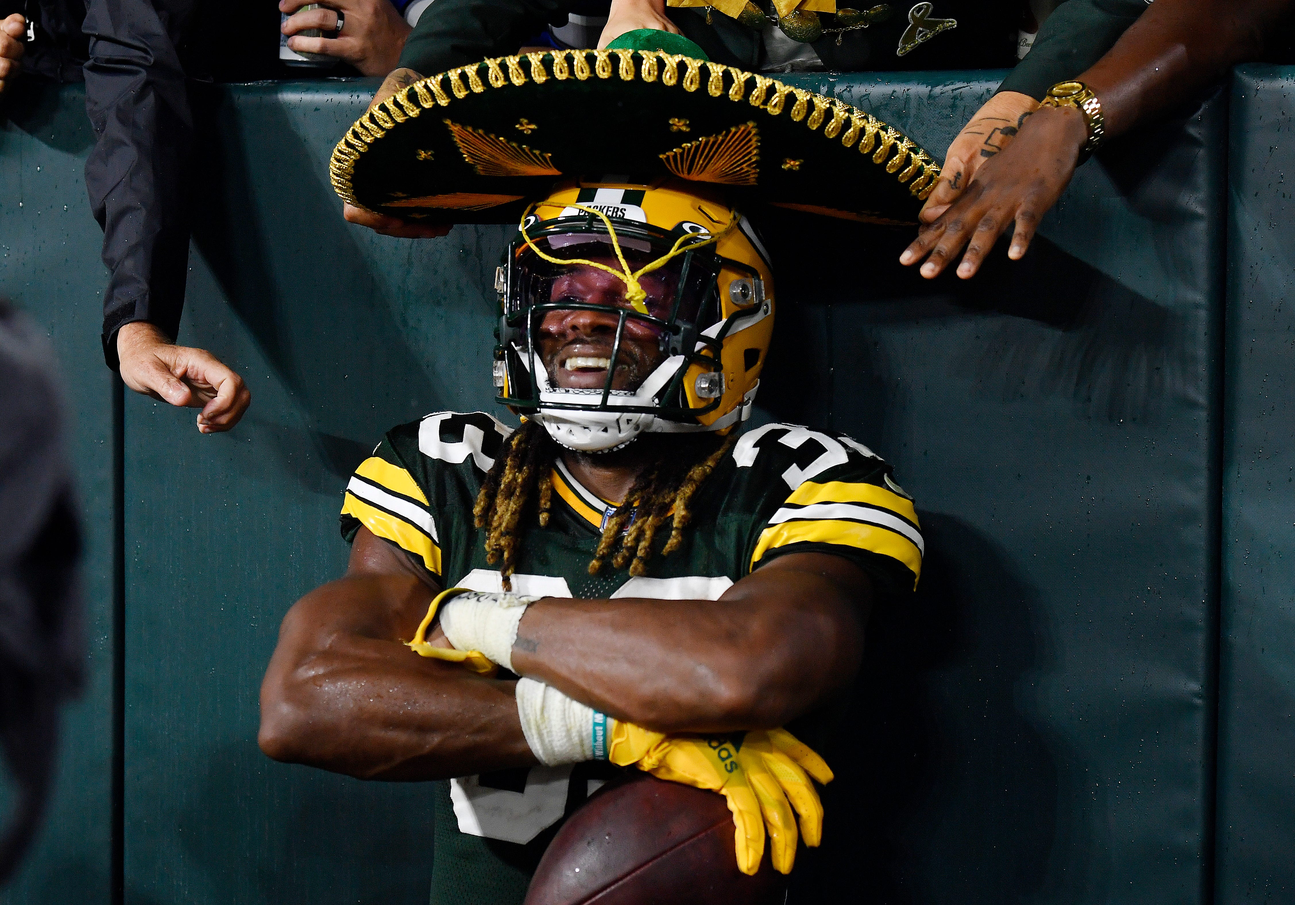 Aaron Jones Wears Sombrero, Aaron Rodgers Adidas Sweats Boarding Plane