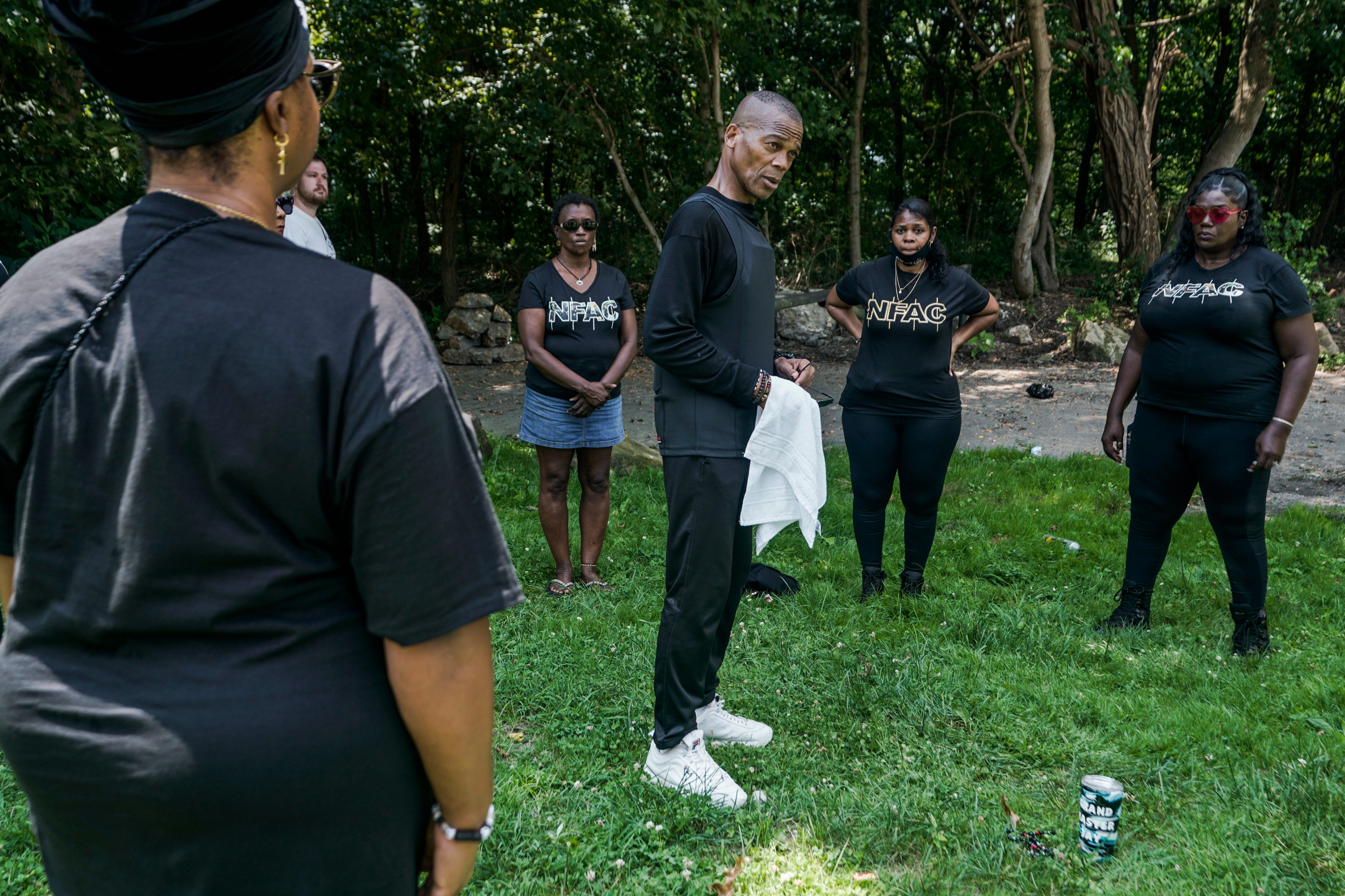 July 24, 2021; Louisville, KY, USA; Prior to NFAC's Feed the People event, John Fitzgerald Johnson, known as “Grandmaster Jay," discusses an allegation of sexual misconduct by a male member of the group toward a female member of the NFAC, Saturday July 24, 2021.. Mandatory Credit: Jessica Koscielniak-USA TODAY