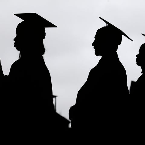 New graduates line up before the start of the Berg