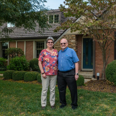 Todd Miller, 57,  and Lisa Miller, 58, in front of