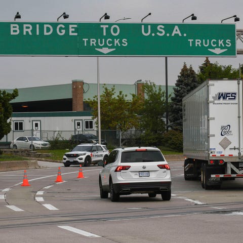 Vehicles head to the Ambassador Bridge border cros