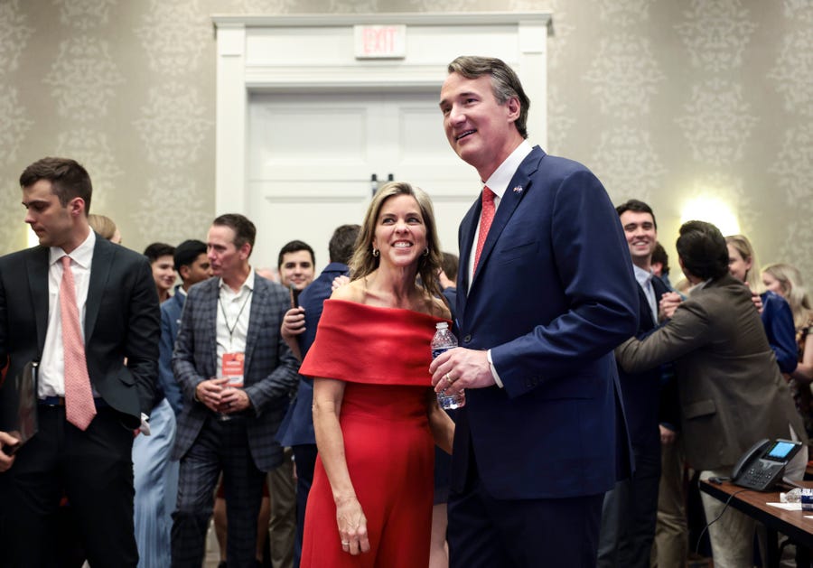 Glenn Youngkin and his wife Suzanne watch results come in on election night at the Westfields Marriott Washington Dulles on Tuesday in Chantilly, Virginia. Youngkin defeated Democrat Terry McAuliffe to become Virginia's next governor.