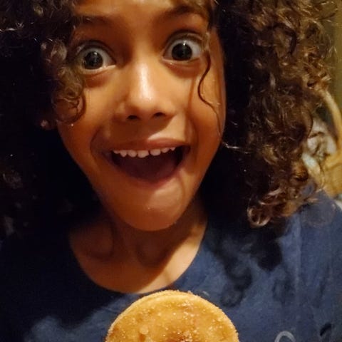 This 6-year-old couldn't wait to try the donuts sh