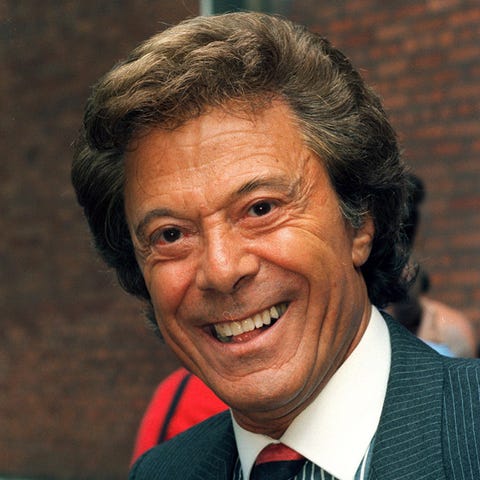 British entertainer Lionel Blair poses for a photo