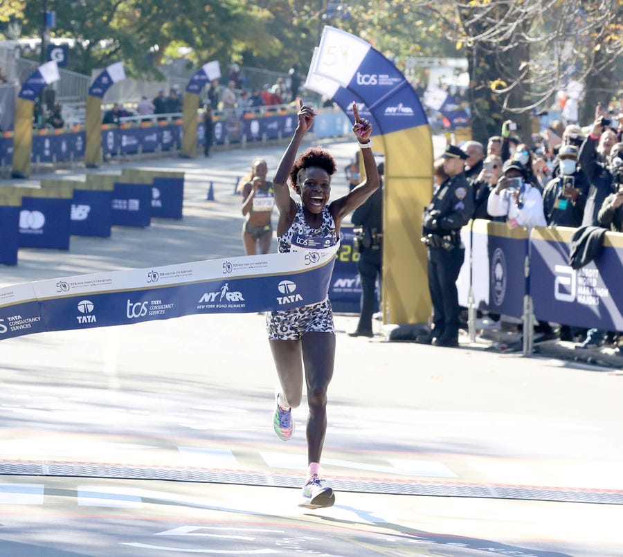 Peres Jepchirchir of Kenya wins the women's race at the New York City Marathon, adding to the Olympic gold she won this summer in Tokyo.