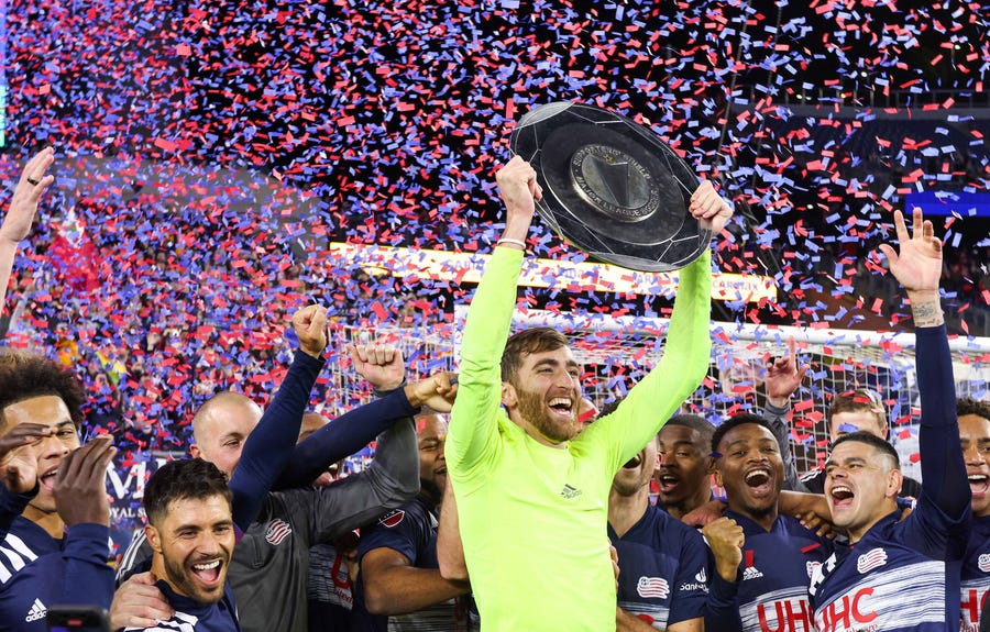 Nov. 7: New England Revolution goalkeeper Matt Turner celebrates winning the 2021 Supporters' Shield after the regular-season finale at Gillette Stadium.