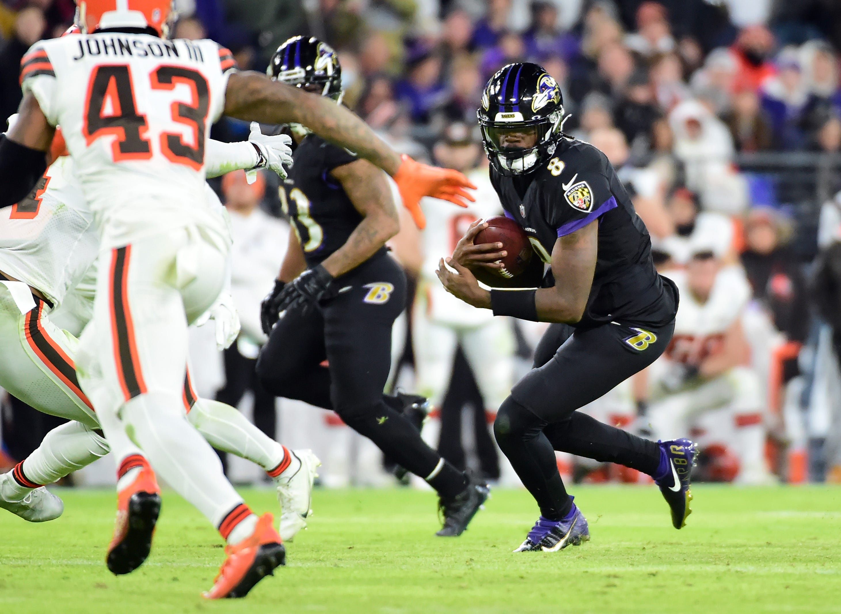 Lamar Jackson, Despite Interceptions, Leads Ravens Past Browns