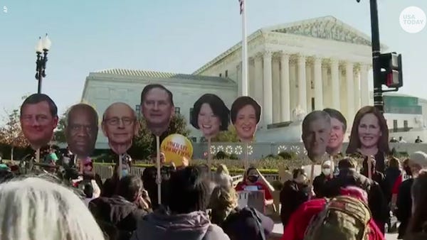 Pro-life and pro-choice protestors gather outside 