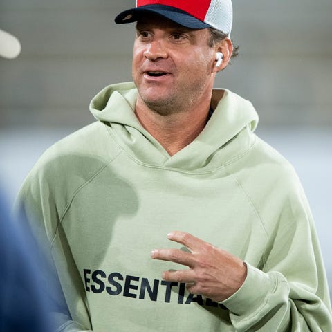 Ole Miss head coach Lane Kiffin watches the action