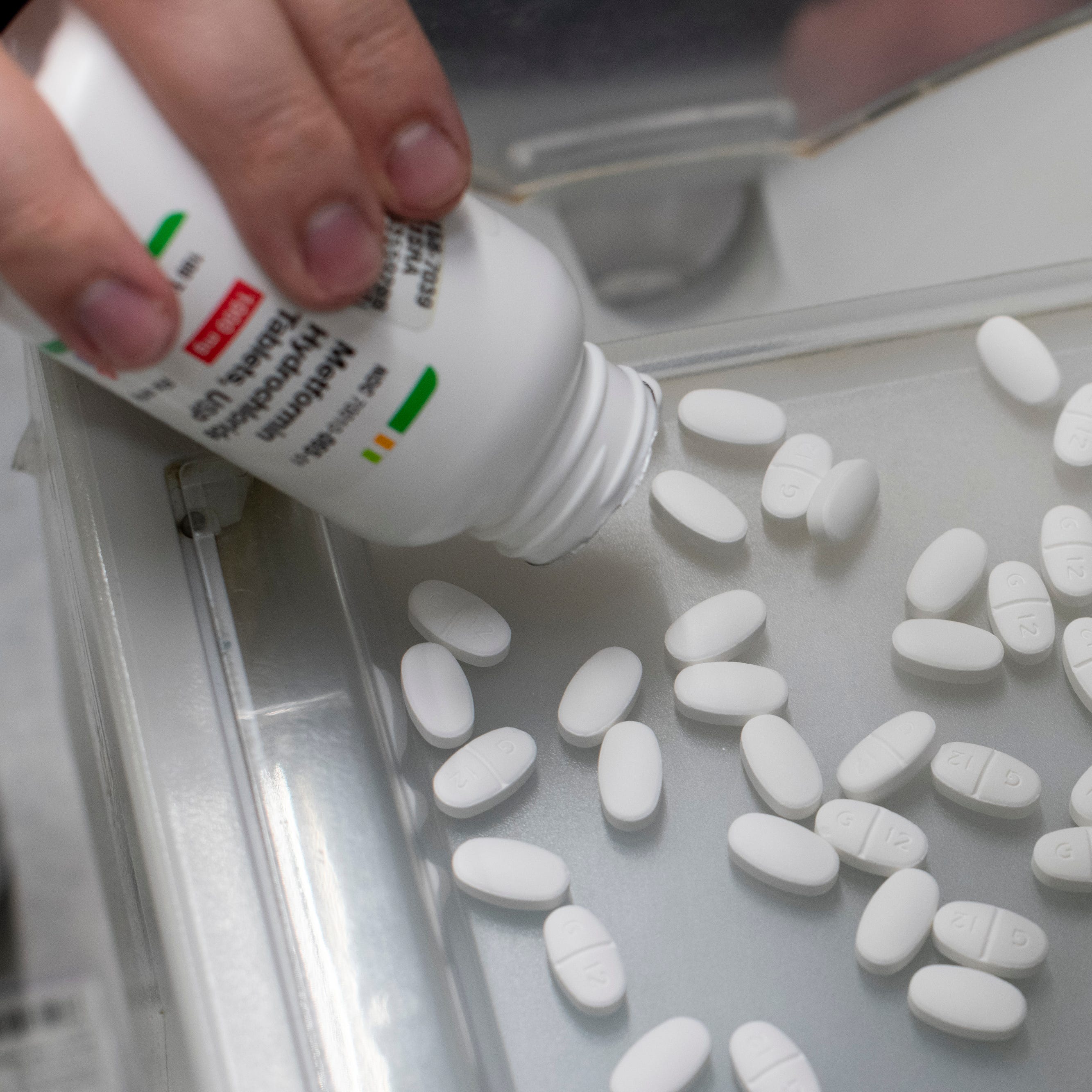 Pharmacy technician Cameron Crow prepares prescriptions at Kiowa Drug in Eads, Colorado.