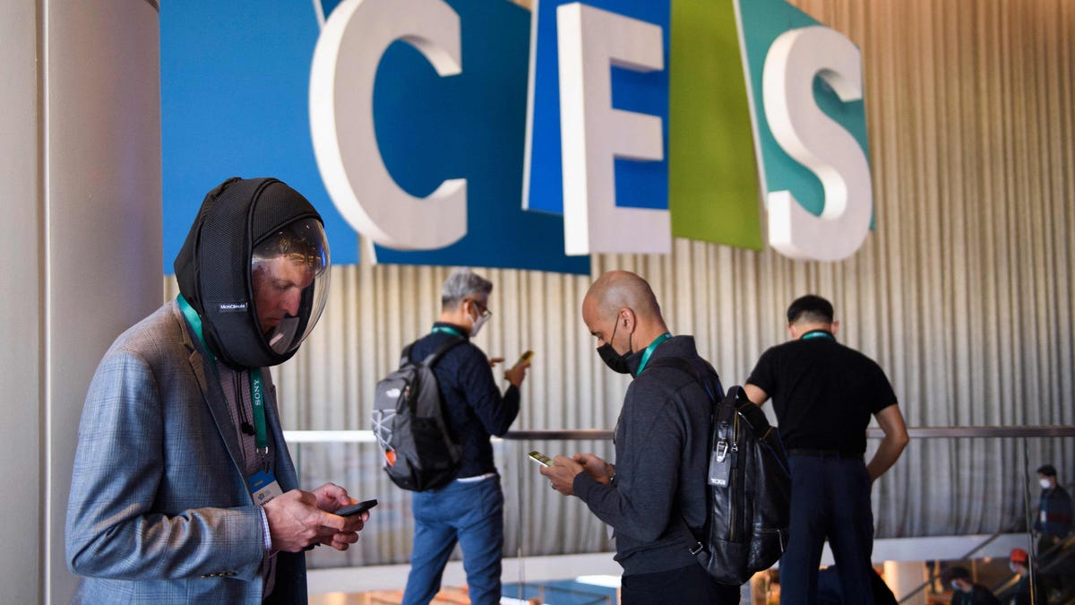 An attendee wears an AIR2 x MicroClimate full face mask at The Venetian Expo during the Consumer Electronics Show (CES) on Jan. 5, 2022 in Las Vegas.