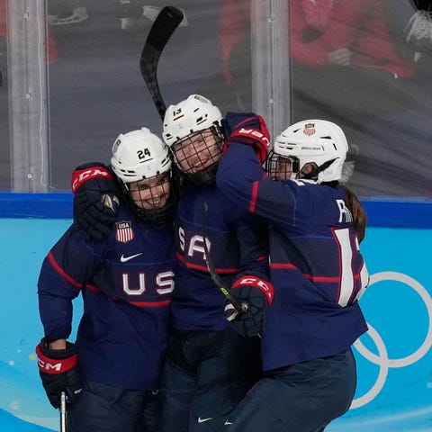 Team USA's Grace Zumwinkle (13) celebrates with te