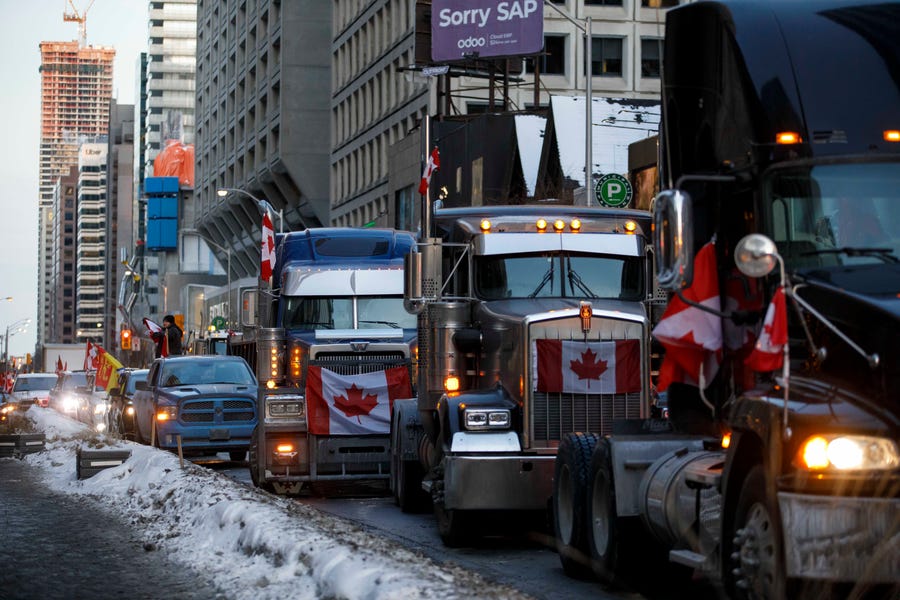 Trucks line streets in Toronto on Feb. 5, 2022. A convoy of truckers and supporters have occupied downtown Ottawa since last Saturday in protest of Canada's COVID-19 vaccine mandate, with convoys branching out to other major cities such as Toronto this weekend.