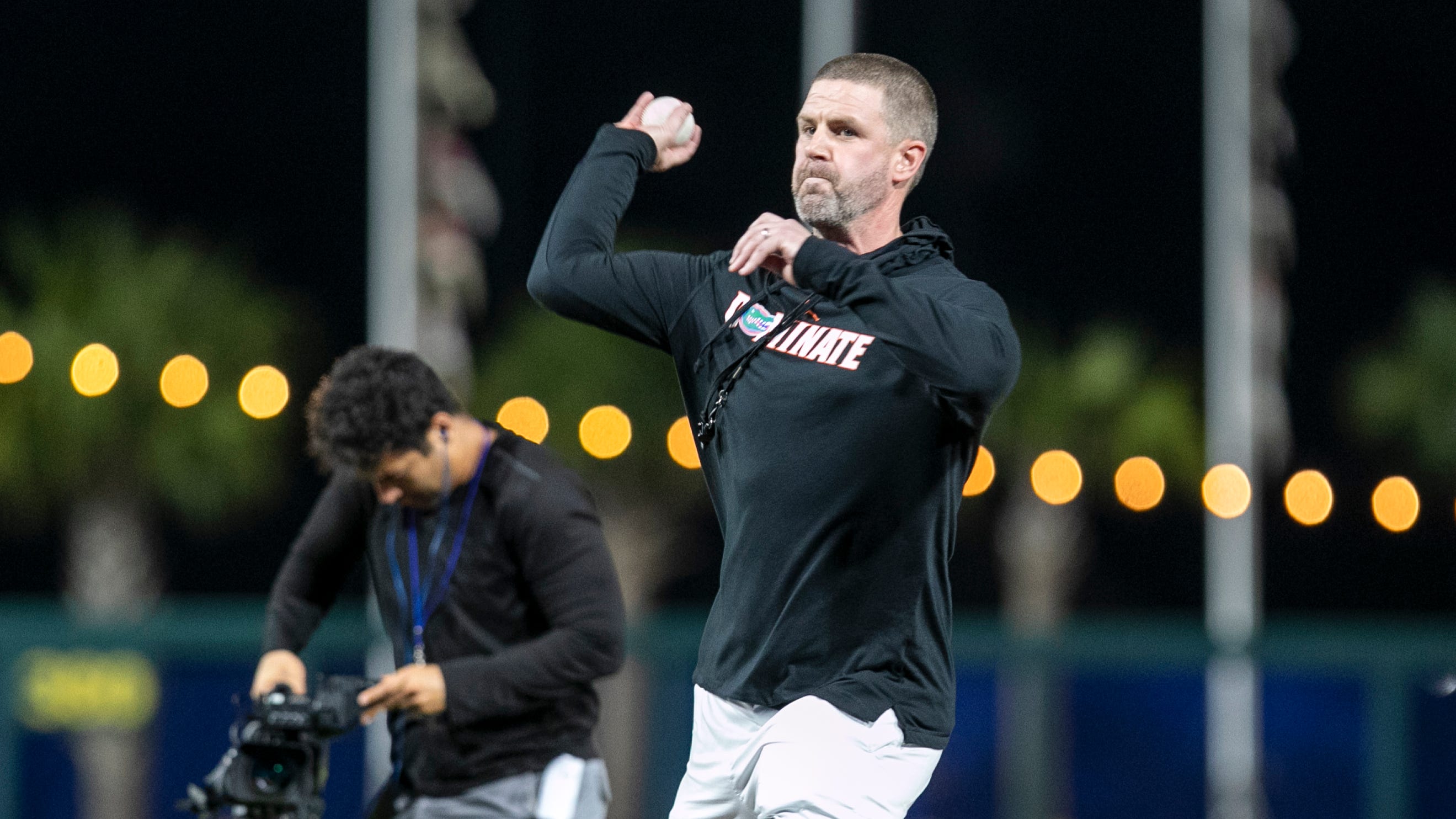 Florida football coach Billy Napier throws out first pitch at UF baseball  game.