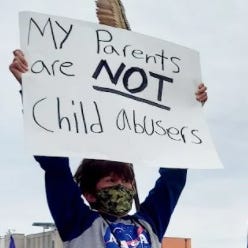 At a local protest against proposed Texas bills that would have labeled parents of transgender children "child abusers." The bills failed in 2021.