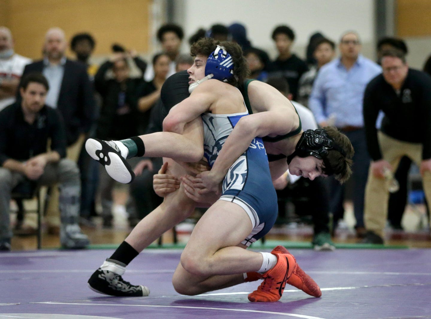 RI state wrestling meet: Coventry dominates with 11 medalists