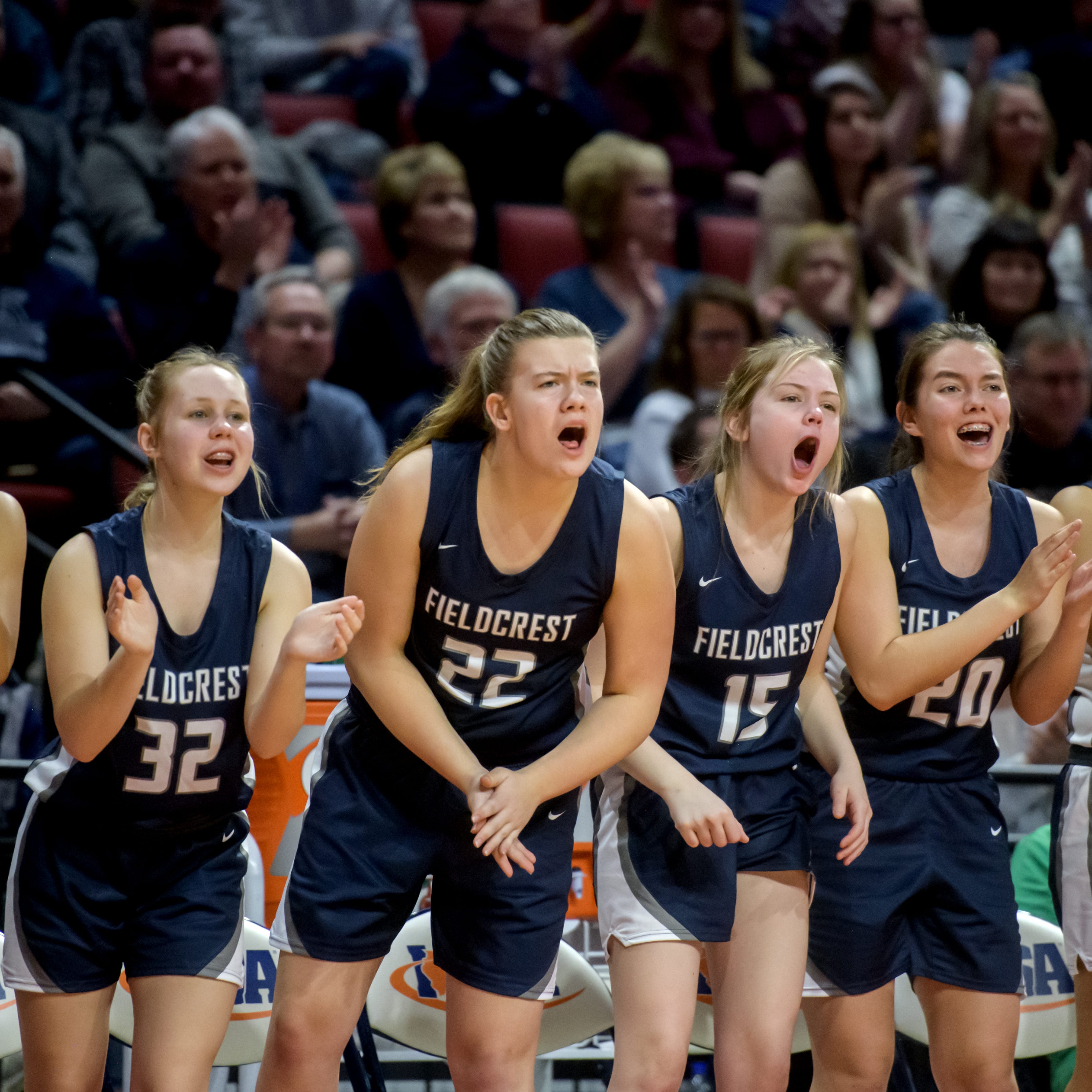 The Fieldcrest bench cheers for their fellow Knights as they battle Winnebago in the first half the Class 2A state semifinals Thursday, March 3, 2022 at Redbird Arena in Normal. Fieldcrest fell to Winnebago 51-47.