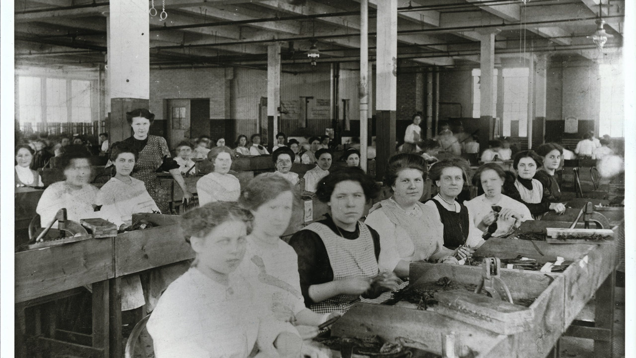 Women making cigars at the San Telmo factory on Michigan Avenue.