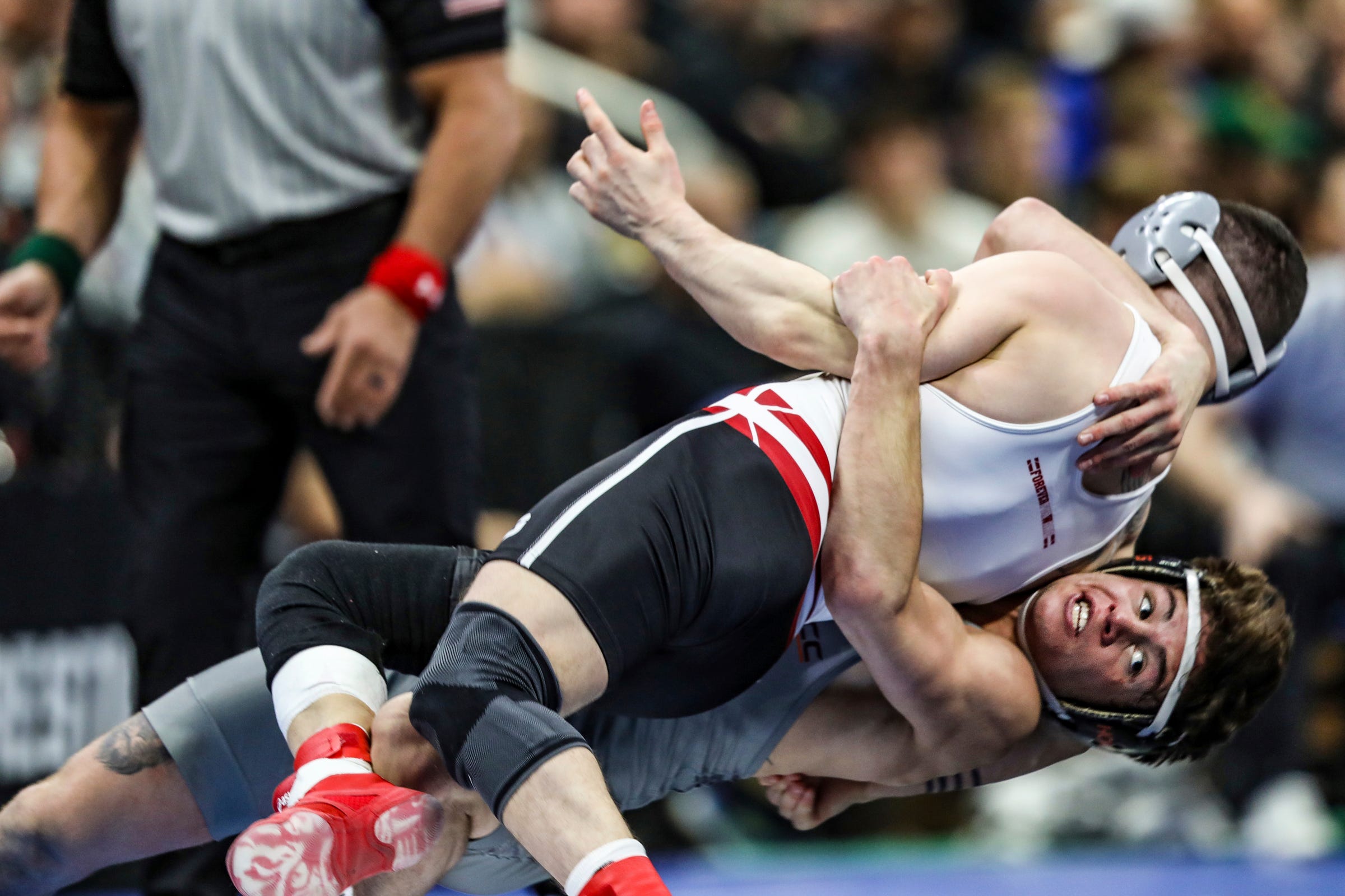 Michigan wrestling's Nick Suriano defeats old foe for national title