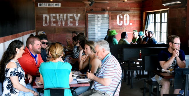 Indoor and outdoor dining featured at the Dewey Beer Company on Coastal Highway in Dewey Beach.