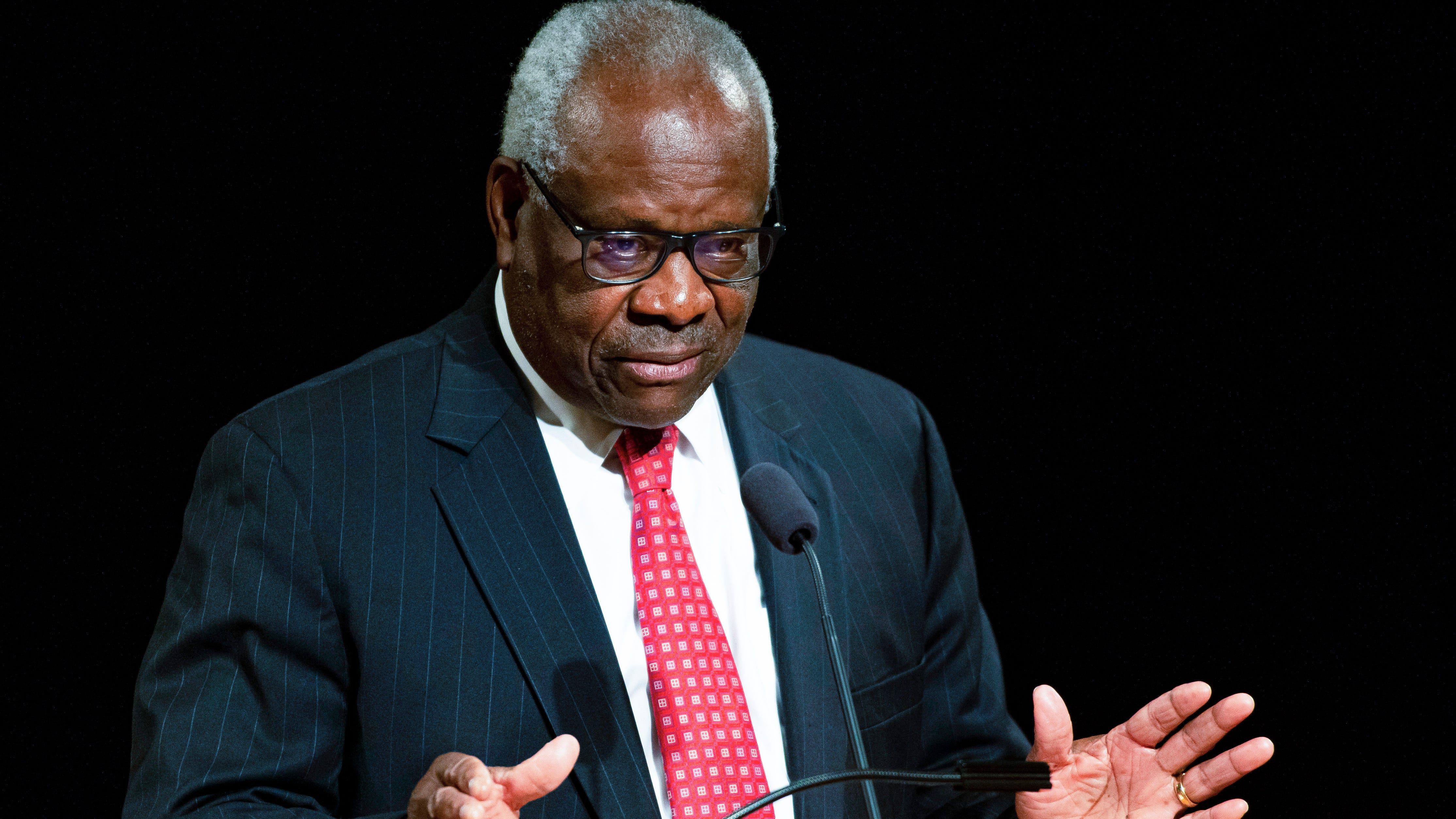 FILE - U.S. Supreme Court Associate Clarence Thomas speaks at the University of Notre Dame in South Bend, Ind., on Sept. 16, 2021. Thomas has been hospitalized because of an infection, the Supreme Court said Sunday, March 20, 2022. Thomas, 73, has been at Sibley Memorial Hospital in Washington, D.C., since Friday, March 18 after experiencing 