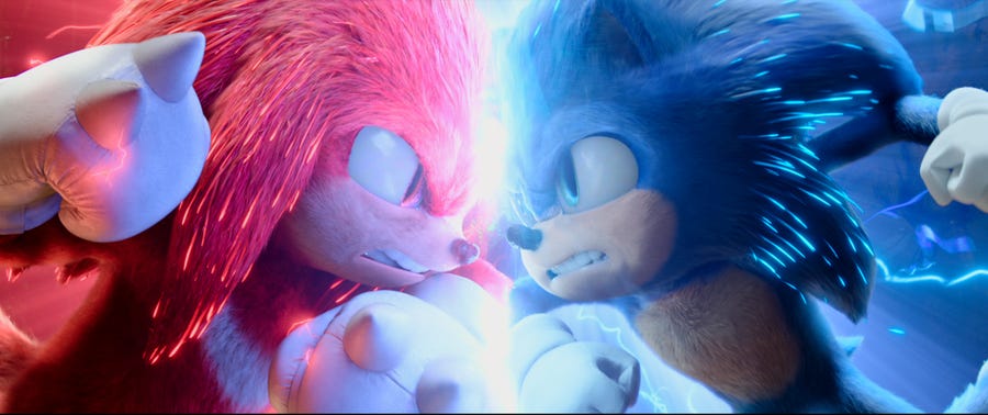 Knuckles (Idris Elba, voiced by left) and Sonic (Ben Schwartz) throw down in "Sonic the Hedgehog 2."