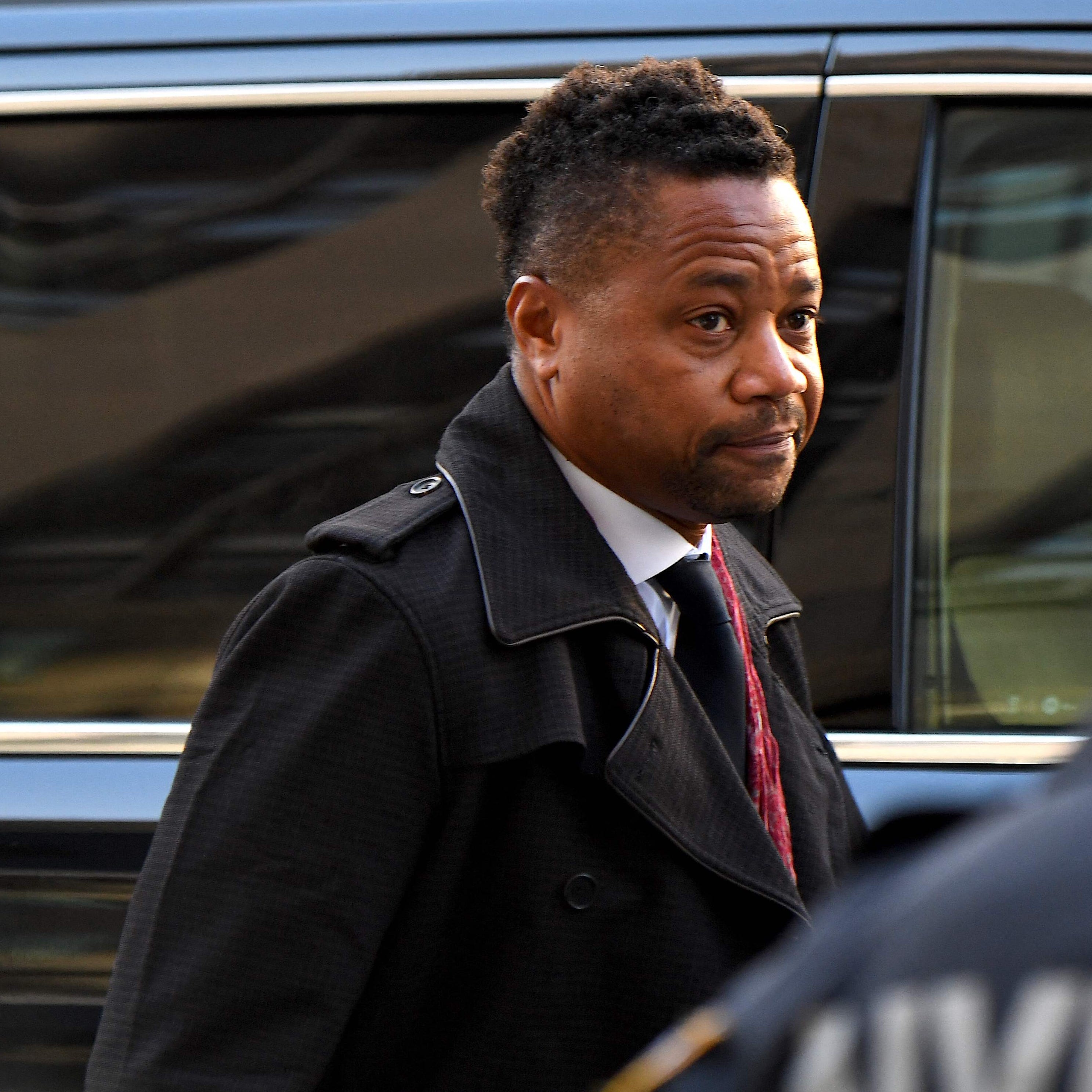 (FILES) In this file photo taken on January 22, 2020, US actor Cuba Gooding Jr arrives at the Manhattan Criminal Court in New York City. - Oscar-winning actor Cuba Gooding Jr admitted forcibly kissing a waitress, his lawyer said on April 13, 2022, in a New York court plea that will see other criminal complaints against him dropped. (Photo by Johannes EISELE / AFP) (Photo by JOHANNES EISELE/AFP via Getty Images) ORG XMIT: 0 ORIG FILE ID: AFP_328A978.jpg