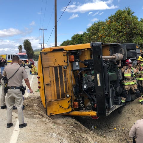 Firefighters and California Highway Patrol officer