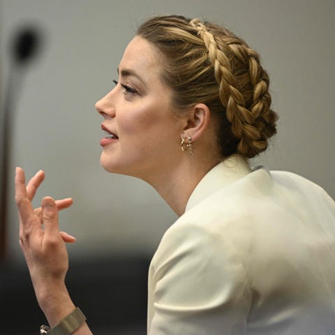 Actress Amber Heard speaks in the courtroom at the