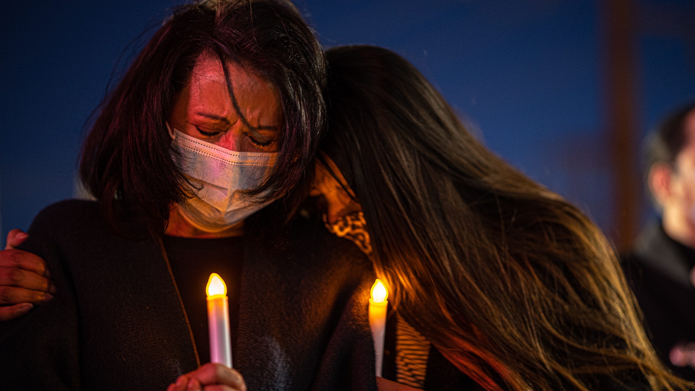 Ernie Chacon's woman  Celia, left, and girl  Sarah Chacon Mendoza be  the candlelight vigil connected  March 10, 2021, extracurricular  Las Palmas Medical Center successful  El Paso. He died of COVID-19 connected  Dec. 11, 2020.