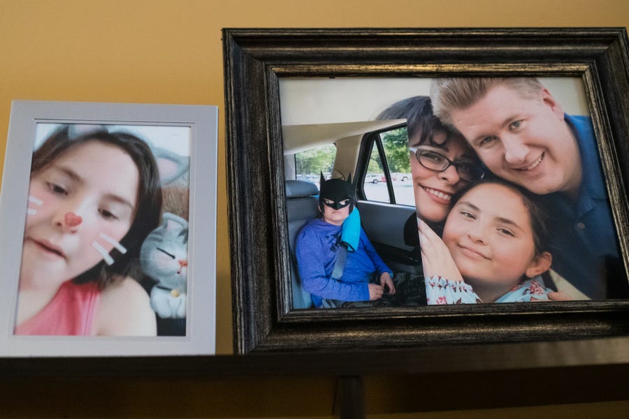 Pictures of Becca Chase sit throughout the home of Mark and Tina Chase in Fishers, Ind., on Oct. 10, 2020.