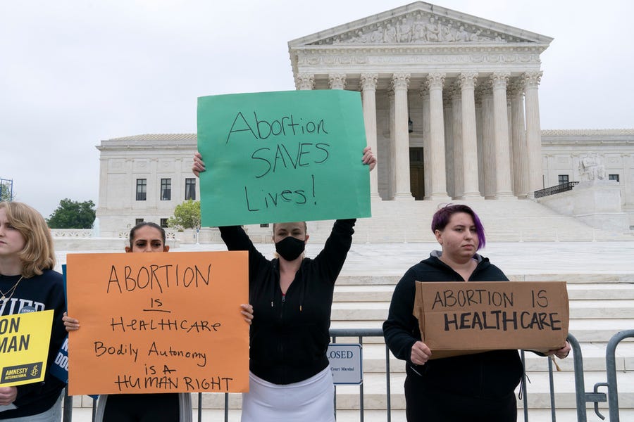 Demonstrators protest outside the U.S. Supreme Court on May 3 in Washington. A draft opinion suggests the court could be poised to overturn the landmark Roe v. Wade case in 1973 that legalized abortion nationwide, according to a Politico report.