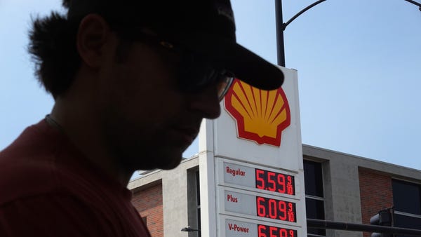 A customer purchases gas at a gas station on May 1