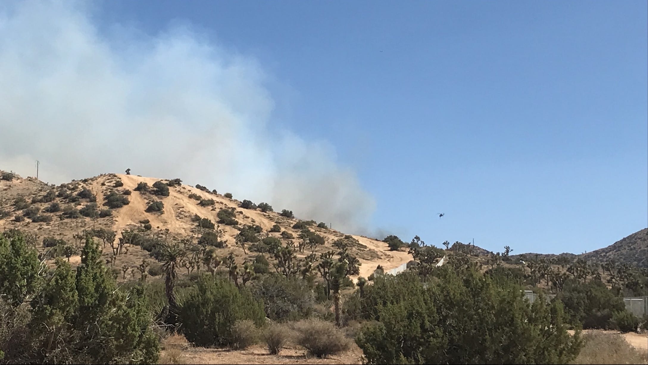 Two arrested for fastmoving fire that threatened Yucca Valley homes