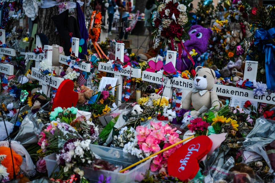 Crosses adorn a makeshift memorial for the victims of the shooting at Robb Elementary School in Uvalde, Texas, on May 31, 2022.