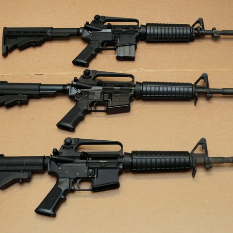 Three variations of the AR-15 assault rifle are di