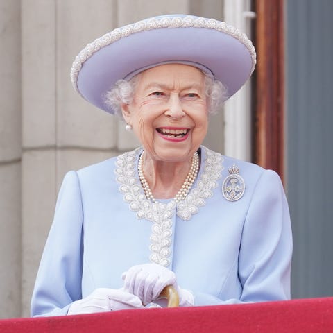 Queen Elizabeth II watches from the balcony of Buc